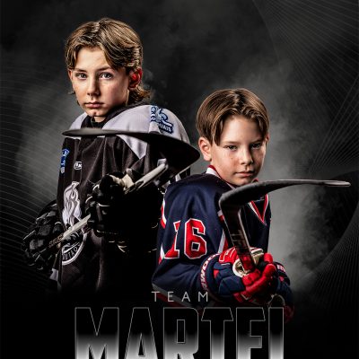 Two young hockey players posing confidently in bold uniforms, showing teamwork, focus, and determination.